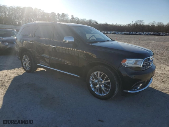 2015 Dodge Durango Citadel with VIN 1C4RDJEG1FC156322, listed as a Copart auction lot 88962145 with 105,438 mi miles and Salvage Title. Bid and sale history available at carsss.com. Image 4.