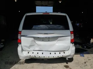 2016 Chrysler Town & Country Touring L Anniversary Edition with VIN 2C4RC1CG3GR284592, listed as a Copart auction lot 62499194 with 98,428 mi miles and Salvage Title. Bid and sale history available at DreamBid. Image 6.