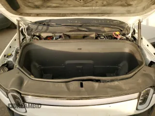 2022 Rivian R1T Adventure z VIN 7FCTGAAA9NN014280, wystawiony jako Copart lot #87908175 z przebiegiem 28 601 mil mil oraz Szkody całkowita. Historia ofert i sprzedaży dostępna na DreamBid. Obrazek 11.