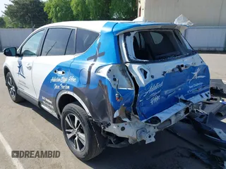 2018 Toyota RAV4 XLE with VIN 2T3WFREV7JW480326, listed as a IAAI auction lot 42021965 with 174,347 mi miles. Bid and sale history available at carsss.com. Image 6.