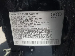 2014 Audi Q7 Premium Plus with VIN WA1LGAFEXED014547, listed as a IAAI auction lot 42639055 with 158,057 mi miles and . Bid and sale history available at DreamBid. Image 9.