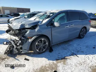 2023 Honda Odyssey Elite z VIN 5FNRL6H90PB057704, wystawiony jako Copart lot #45603865 z przebiegiem Nie podano mil oraz Szkoda całkowita • Salvage title. Historia ofert i sprzedaży dostępna na DreamBid. Obrazek 1.