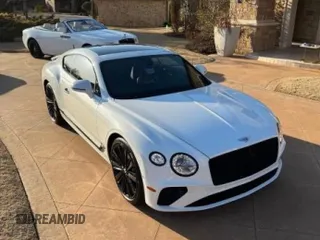 2023 Bentley Continental GT Mulliner with VIN SCBCT2ZG7PC004767, listed as a Copart auction lot 53576785 with 5,097 mi miles and Clean Title. Bid and sale history available at DreamBid. Image 1.