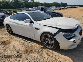 2014 BMW M6 z VIN WBSLX9C53ED160497, wystawiony jako Copart lot #62826444 z przebiegiem 55 639 mil mil oraz Szkody całkowita. Historia ofert i sprzedaży dostępna na DreamBid. Obrazek 4.