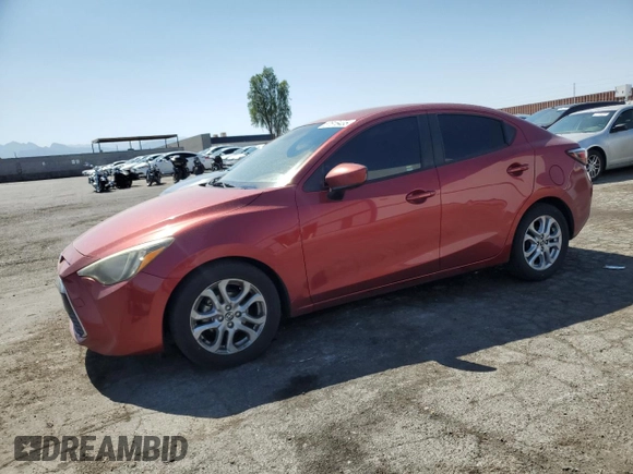 2016 Scion iA z VIN 3MYDLBZV3GY122064, wystawiony jako Copart lot #57616435 z przebiegiem 100 556 mil mil oraz Szkoda całkowita • Salvage title. Historia ofert i sprzedaży dostępna na DreamBid. Obrazek 1.