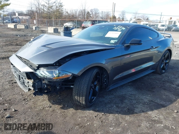 2021 Ford Mustang EcoBoost with VIN 1FA6P8TH4M5136345, listed as a IAAI auction lot 41503885 with 18,853 mi miles. Bid and sale history available at carsss.com. Image 18.