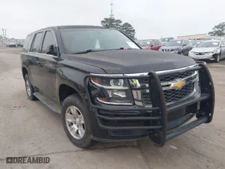 2017 Chevrolet Tahoe Commercial with VIN 1GNLCDECXHR304319, listed as a IAAI auction lot 41924011 with 130,566 mi miles. Bid and sale history available at carsss.com. Image 1.
