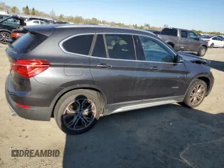 2017 BMW X1 sDrive28i with VIN WBXHU7C3XH5H36874, listed as a Copart auction lot 50607235 with 100,458 mi miles and Clean Title. Bid and sale history available at carsss.com. Image 3.