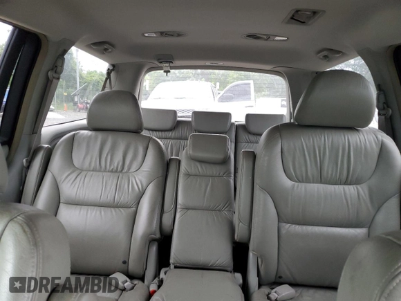 2006 Honda Odyssey EX-L z VIN 5FNRL38706B019434, wystawiony jako Copart lot #57397755 z przebiegiem 175 406 mil mil oraz Szkoda całkowita • Salvage title. Historia ofert i sprzedaży dostępna na DreamBid. Obrazek 10.