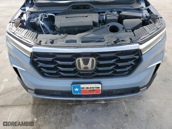 2025 Honda Pilot Touring with VIN 5FNYG2H78SB000571, listed as a Copart auction lot 45391595 with 6,916 mi miles and Salvage Title. Bid and sale history available at carsss.com. Image 13.
