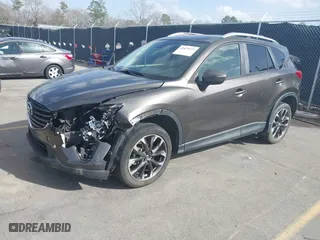 2016 Mazda CX-5 Grand Touring with VIN JM3KE2DY1G0649720, listed as a IAAI auction lot 41674273 with 184,483 mi miles. Bid and sale history available at carsss.com. Image 18.