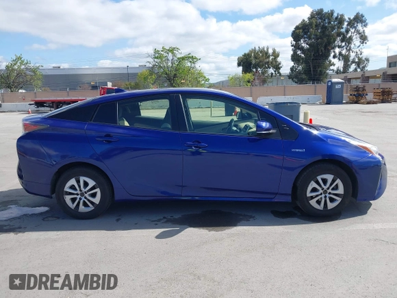 2016 Toyota Prius Two z VIN JTDKBRFU7G3528399, wystawiony jako IAAI lot #41975628 z przebiegiem 188 282 mil mil oraz . Historia ofert i sprzedaży dostępna na DreamBid. Obrazek 13.