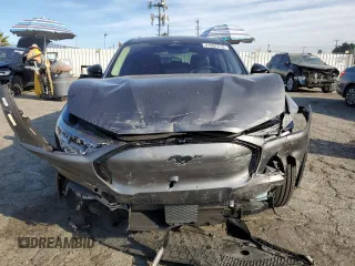 2021 Ford Mustang Mach-E Premium z VIN 3FMTK3R73MMA28172, wystawiony jako Copart lot #41907515 z przebiegiem 12 518 mil mil oraz Szkoda całkowita • Salvage title. Historia ofert i sprzedaży dostępna na DreamBid. Obrazek 5.