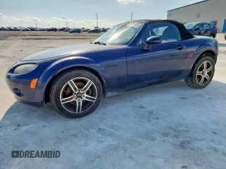 2007 Mazda MX-5 Miata Touring with VIN JM1NC25F770138120, listed as a Copart auction lot 60777425 with 184,029 mi miles and Salvage title. Bid and sale history available at DreamBid. Image 1.