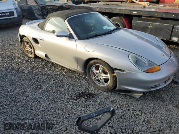 2000 Porsche Boxster z VIN WP0CA2980YU626179, wystawiony jako Copart lot #44728325 z przebiegiem 103 173 mil mil oraz Szkody całkowita. Historia ofert i sprzedaży dostępna na DreamBid. Obrazek 4.