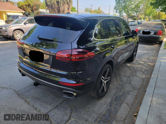 2016 Porsche Cayenne with VIN WP1AA2A26GLA10262, listed as a Copart auction lot 54455435 with 145,692 mi miles and Clean Title. Bid and sale history available at carsss.com. Image 4.