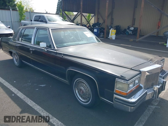 1987 Cadillac Brougham z VIN 1G6DW51Y0H9753376, wystawiony jako IAAI lot #42114437 z przebiegiem 69 484 mil mil oraz . Historia ofert i sprzedaży dostępna na DreamBid. Obrazek 1.