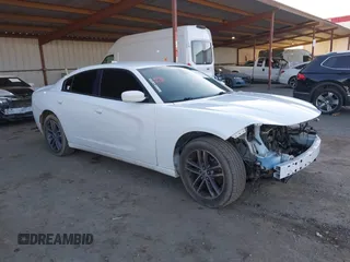 2019 Dodge Charger SXT with VIN 2C3CDXJG1KH533323, listed as a IAAI auction lot 41369282 with 102,467 mi miles and . Bid and sale history available at DreamBid. Image 1.