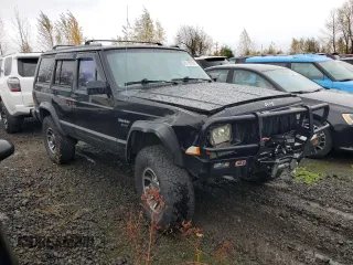 1996 Jeep Cherokee Sport with VIN 1J4FJ68S4TL240696, listed as a Copart auction lot 81193184 with 125,682 mi miles and Salvage Title. Bid and sale history available at carsss.com. Image 4.