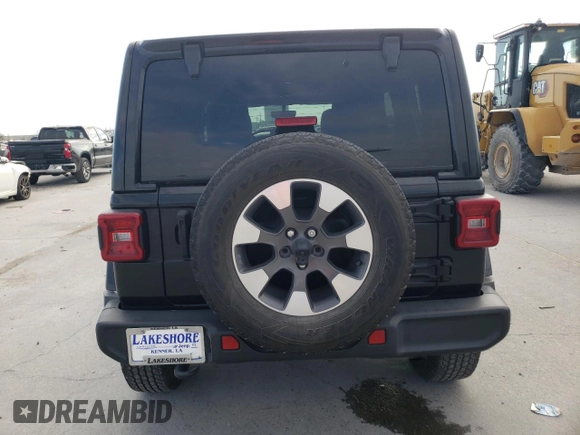 2022 Jeep Wrangler Unlimited Sahara with VIN 1C4HJXEG3NW248021, listed as a Copart auction lot 47555775 with 31,479 mi miles and Salvage Title. Bid and sale history available at DreamBid. Image 6.