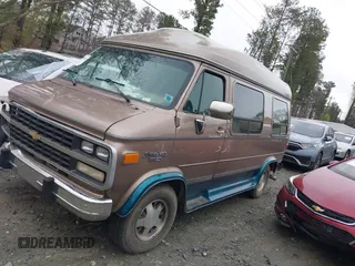 1995 Chevrolet Chevy Van z VIN 1GBEG25K8SF245639, wystawiony jako IAAI lot #41917862 z przebiegiem 89 015 mil mil oraz . Historia ofert i sprzedaży dostępna na DreamBid. Obrazek 14.