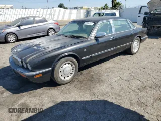 2000 Jaguar XJ Vanden Plas with VIN SAJDA24C3YLF20206, listed as a Copart auction lot 73860524 with Not provided miles and Salvage title. Bid and sale history available at DreamBid. Image 1.