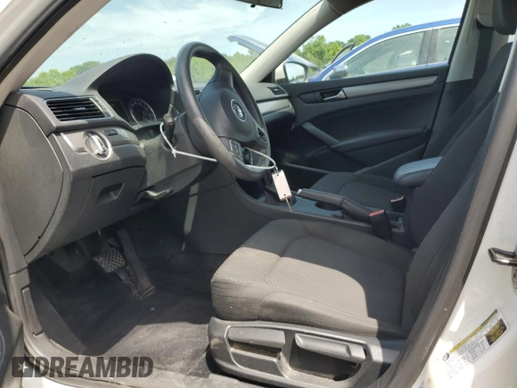 2014 Volkswagen Passat Wolfsburg Edition with VIN 1VWAT7A39EC081810, listed as a Copart auction lot 62676645 with 121,642 mi miles and Salvage title. Bid and sale history available at DreamBid. Image 7.
