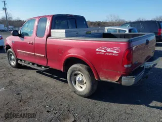 2000 Ford F-150 XL with VIN 1FTRX18W2YNB60283, listed as a IAAI auction lot 41510168 with 237,825 mi miles. Bid and sale history available at carsss.com. Image 3.