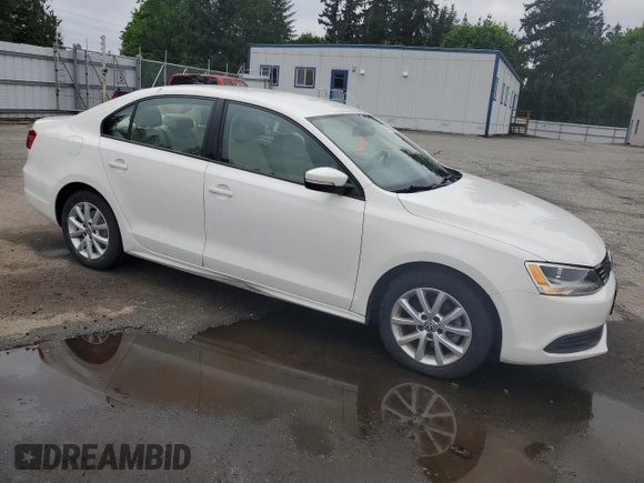 2012 Volkswagen Jetta SE with VIN 3VWDP7AJ5CM301293, listed as a Copart auction lot 57131005 with 93,898 mi miles and Salvage title. Bid and sale history available at DreamBid. Image 4.
