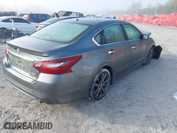2018 Nissan Altima 2.5 SR with VIN 1N4AL3AP3JC251822, listed as a IAAI auction lot 41875517 with 135,808 mi miles. Bid and sale history available at carsss.com. Image 4.