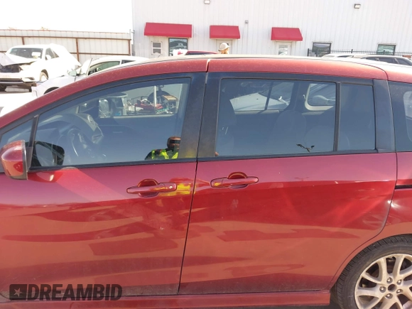 2012 Mazda Mazda5 Grand Touring with VIN JM1CW2DL1C0132281, listed as a IAAI auction lot 41698161 with 121,179 mi miles. Bid and sale history available at carsss.com. Image 14.