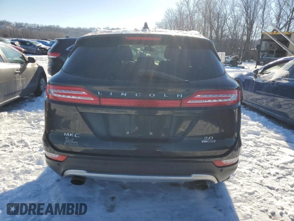 2015 Lincoln MKC with VIN 5LMCJ1A93FUJ36498, listed as a Copart auction lot 87825565 with 222,477 mi miles and Salvage Title. Bid and sale history available at DreamBid. Image 6.