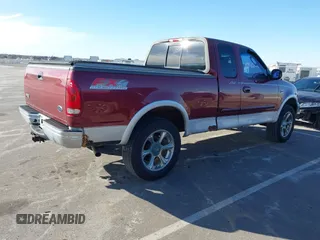 2003 Ford F-150 XL with VIN 1FTRX18L13NA55281, listed as a IAAI auction lot 41694883 with 101,777 mi miles. Bid and sale history available at carsss.com. Image 4.