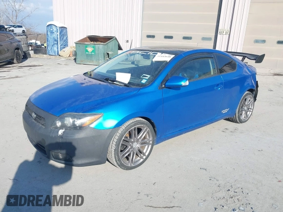 2010 Scion tC with VIN JTKDE3B78A0315248, listed as a IAAI auction lot 41442648 with 125,037 mi miles. Bid and sale history available at carsss.com. Image 2.