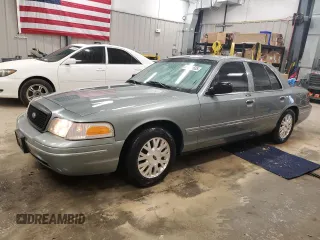 2005 Ford Crown Victoria LX z VIN 2FAFP74WX5X102028, wystawiony jako Copart lot #51171635 z przebiegiem 82 117 mil mil oraz Czysty tytuł • Clean title. Historia ofert i sprzedaży dostępna na DreamBid. Obrazek 1.