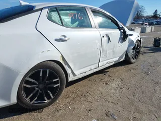 2015 Kia Optima LX with VIN KNAGM4A73F5600350, listed as a IAAI auction lot 41811976 with 154,924 mi miles. Bid and sale history available at carsss.com. Image 12.