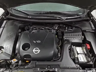 2014 Nissan Maxima S z VIN 1N4AA5AP4EC457884, wystawiony jako Copart lot #84265895 z przebiegiem 109 673 mil mil oraz Czysty tytuł • Clean title. Historia ofert i sprzedaży dostępna na DreamBid. Obrazek 12.