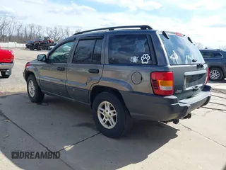 2003 Jeep Grand Cherokee Laredo with VIN 1J4GX48S53C504225, listed as a IAAI auction lot 41879669 with 247,246 mi miles. Bid and sale history available at carsss.com. Image 3.