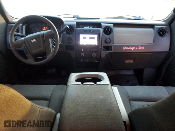 2009 Ford F-150 STX with VIN 1FTRX12879KB52256, listed as a Copart auction lot 44255075 with 211,613 mi miles and Salvage Title. Bid and sale history available at carsss.com. Image 8.