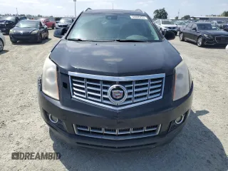 2013 Cadillac SRX Performance Collection z VIN 3GYFNHE37DS609463, wystawiony jako Copart lot #54606255 z przebiegiem 180 059 mil mil oraz Szkoda całkowita • Salvage title. Historia ofert i sprzedaży dostępna na DreamBid. Obrazek 5.