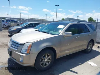 2006 Cadillac SRX z VIN 1GYEE637X60160053, wystawiony jako IAAI lot #42289771 z przebiegiem 140 970 mil mil oraz . Historia ofert i sprzedaży dostępna na DreamBid. Obrazek 2.