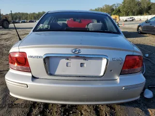 2004 Hyundai Sonata GLS with VIN KMHWF35H44A959602, listed as a Copart auction lot 72344984 with 76,848 mi miles and Salvage Title. Bid and sale history available at carsss.com. Image 6.