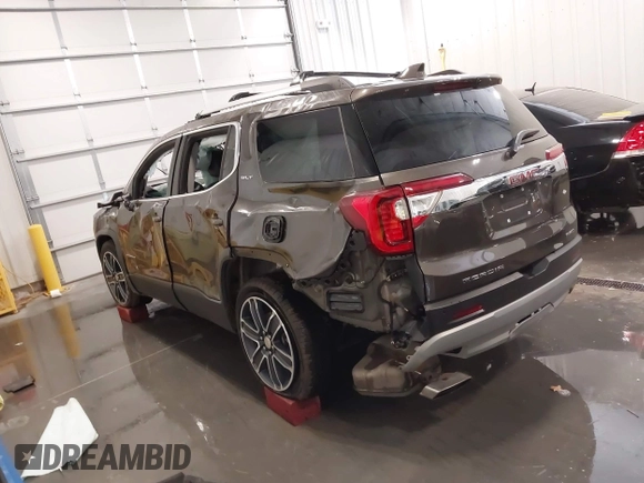 2020 GMC Acadia SLT with VIN 1GKKNULS8LZ154037, listed as a IAAI auction lot 42061743 with 54,657 mi miles and . Bid and sale history available at DreamBid. Image 3.