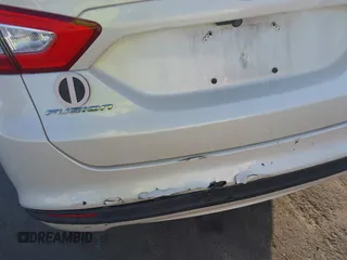 2015 Ford Fusion SE Hybrid with VIN 3FA6P0LU2FR305597, listed as a IAAI auction lot 42168292 with 97,688 mi miles and . Bid and sale history available at DreamBid. Image 14.