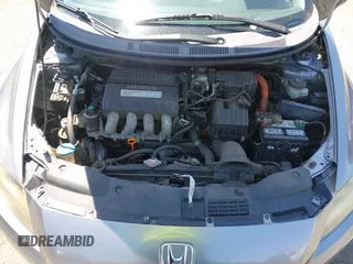 2011 Honda CR-Z EX with VIN JHMZF1D61BS002811, listed as a IAAI auction lot 42140932 with 113,164 mi miles. Bid and sale history available at carsss.com. Image 10.