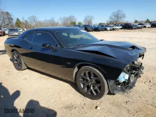 2023 Dodge Challenger R/T with VIN 2C3CDZBT0PH515247, listed as a Copart auction lot 45588055 with 35,452 mi miles and Salvage Title. Bid and sale history available at carsss.com. Image 4.