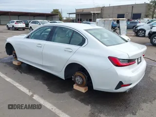 2021 BMW 3 Series 330i z VIN 3MW5R1J08M8C07261, wystawiony jako IAAI lot #41861814 z przebiegiem 87 426 mil mil oraz . Historia ofert i sprzedaży dostępna na DreamBid. Obrazek 3.