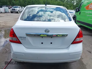 2010 Nissan Versa S with VIN 3N1BC1AP2AL409285, listed as a IAAI auction lot 42182721 with 266,855 mi miles and . Bid and sale history available at DreamBid. Image 16.