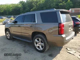 2016 Chevrolet Tahoe LT with VIN 1GNSCBKCXGR241872, listed as a Copart auction lot 59628315 with 156,862 mi miles and Salvage title. Bid and sale history available at DreamBid. Image 2.