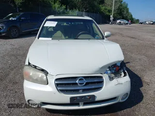 2003 Nissan Maxima GLE with VIN JN1DA31A03T421052, listed as a IAAI auction lot 42556685 with 240,183 mi miles and . Bid and sale history available at DreamBid. Image 13.